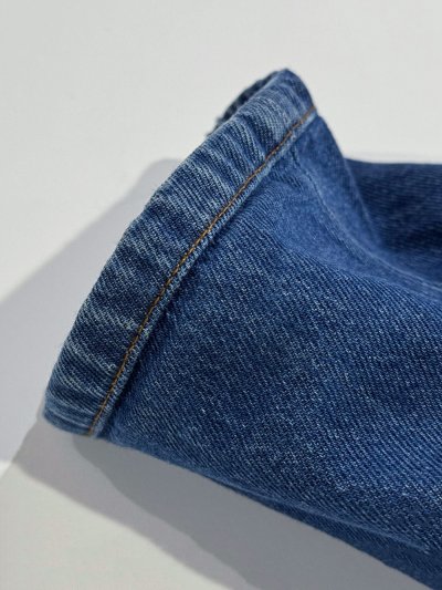 Подшить (укоротить) с сохранением оригинального шва