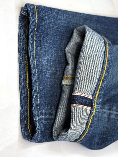 Подшить (укоротить) с сохранением оригинального шва